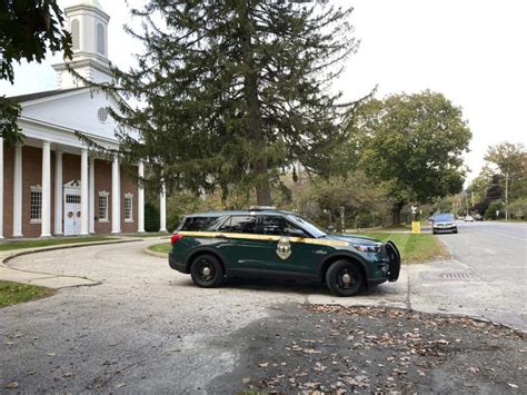 Police search for killer of retired Vermont college dean who was shot on trail near campus